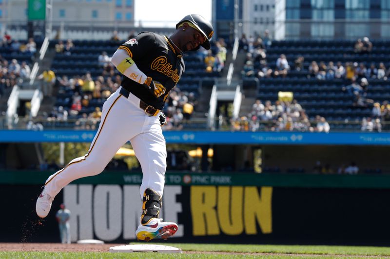 Sep 8, 2024; Pittsburgh, Pennsylvania, USA;  Pittsburgh Pirates designated hitter Andrew McCutchen (22) circles the bases on a solo home run against the Washington Nationals during the third inning at PNC Park. Mandatory Credit: Charles LeClaire-Imagn Images