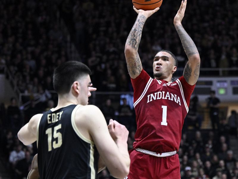 Feb 25, 2023; West Lafayette, Indiana, USA; Indiana Hoosiers guard Jalen Hood-Schifino (1) shoots the ball over Purdue Boilermakers center Zach Edey (15) during the first half at Mackey Arena. Mandatory Credit: Marc Lebryk-USA TODAY Sports