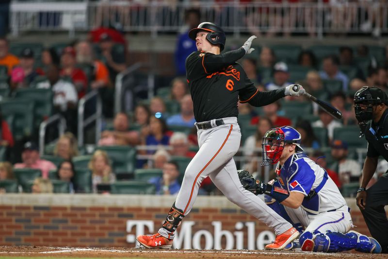 May 6, 2023; Atlanta, Georgia, USA; Baltimore Orioles first baseman Ryan Mountcastle (6) hits a single against the Atlanta Braves in the sixth inning at Truist Park. Mandatory Credit: Brett Davis-USA TODAY Sports