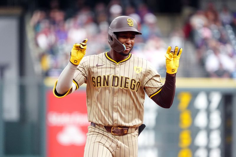 Apr 25, 2024; Denver, Colorado, USA; San Diego Padres outfielder Jurickson Profar (10) celebrates his two run home run in the eighth inning against the Colorado Rockies at Coors Field. Mandatory Credit: Ron Chenoy-USA TODAY Sports