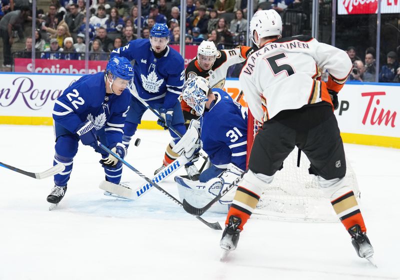 Feb 17, 2024; Toronto, Ontario, CAN; Toronto Maple Leafs goaltender Martin Jones (31) tries to handle the puck against the Anaheim Ducks during the second period at Scotiabank Arena. Mandatory Credit: Nick Turchiaro-USA TODAY Sports