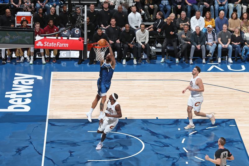 MINNEAPOLIS, MN -  MARCH 22: Kyle Anderson #1 of the Minnesota Timberwolves dunks the ball during the game against the Cleveland Cavaliers on March 22, 2024 at Target Center in Minneapolis, Minnesota. NOTE TO USER: User expressly acknowledges and agrees that, by downloading and or using this Photograph, user is consenting to the terms and conditions of the Getty Images License Agreement. Mandatory Copyright Notice: Copyright 2024 NBAE (Photo by David Sherman/NBAE via Getty Images)