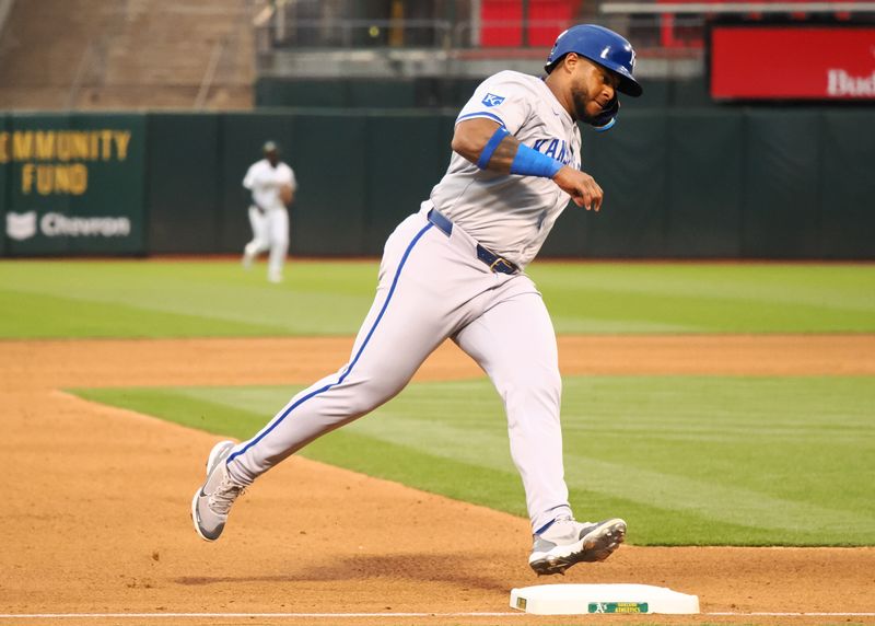 Jun 19, 2024; Oakland, California, USA; Kansas City Royals designated hitter Nelson Velazquez (17) rounds the base on a run against the Oakland Athletics during the fifth inning at Oakland-Alameda County Coliseum. Mandatory Credit: Kelley L Cox-USA TODAY Sports