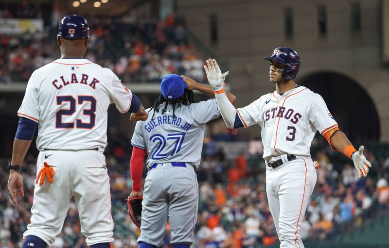 Apr 3, 2024; Houston, Texas, USA; Houston Astros shortstop Jeremy Pena (3) reacts after an RBI single during the fifth inning against the Toronto Blue Jays at Minute Maid Park. Mandatory Credit: Troy Taormina-USA TODAY Sports
