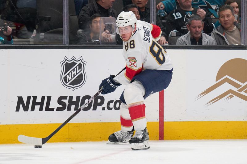 Jan 25, 2025; San Jose, California, USA; Florida Panthers defenseman Nate Schmidt (88) plays the puck against the San Jose Sharks during the second period at SAP Center at San Jose. Mandatory Credit: Robert Edwards-Imagn Images