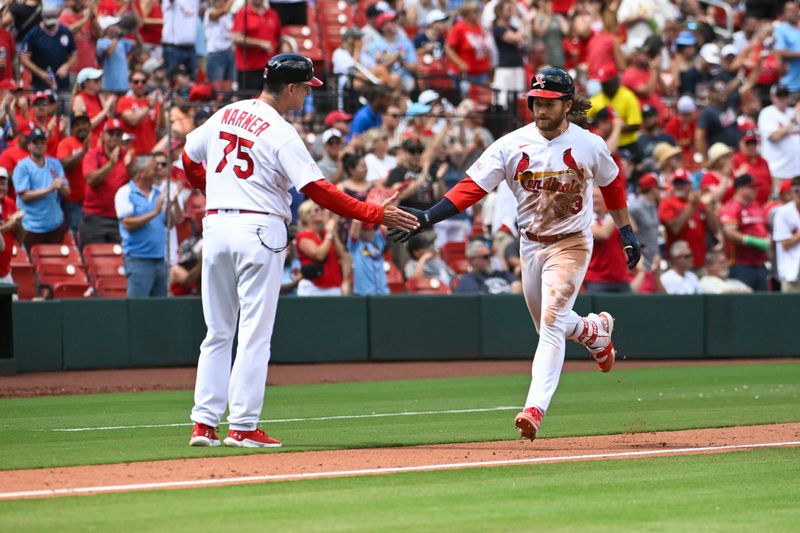 Jul 2, 2023; St. Louis, Missouri, USA; St. Louis Cardinals designated hitter Brendan Donovan (33) is congratulated by St. Louis Cardinals third base coach Ron 'Pop' Warner (75) after Donovan hit a two-run home run against the New York Yankees in the seventh inning at Busch Stadium. Mandatory Credit: Joe Puetz-USA TODAY Sports