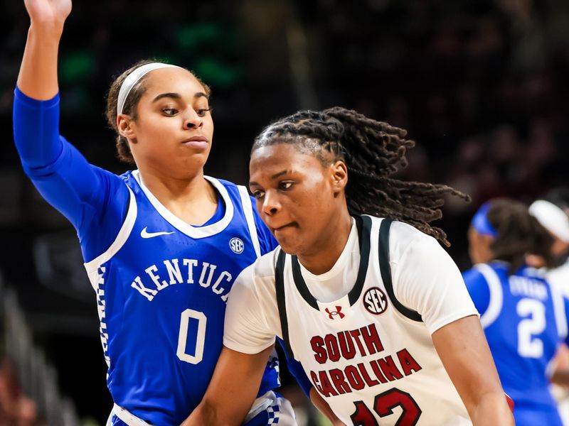 Jan 15, 2024; Columbia, South Carolina, USA; South Carolina Gamecocks guard MiLaysia Fulwiley (12) drives around Kentucky Wildcats guard Brooklynn Miles (0) in the second half at Colonial Life Arena. Mandatory Credit: Jeff Blake-USA TODAY Sports