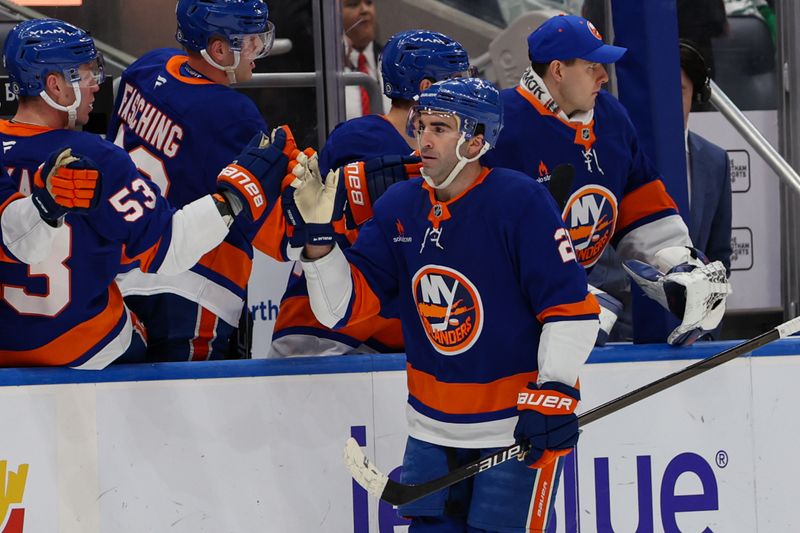 Mar 1, 2025; Elmont, New York, USA;  New York Islanders center Kyle Palmieri (21) celebrates his goal against the Nashville Predators during the first period at UBS Arena. Mandatory Credit: Thomas Salus-Imagn Images