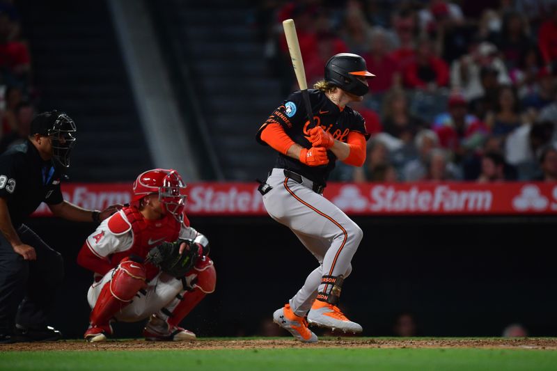 May 10, 2025; Anaheim, California, USA; Baltimore Orioles designated hitter Gunnar Henderson (2) hits a single against the Los Angeles Angels during the sixth inning at Angel Stadium. Mandatory Credit: Gary A. Vasquez-Imagn Images