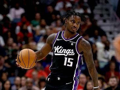 NEW ORLEANS, LOUISIANA - NOVEMBER 20: Davion Mitchell #15 of the Sacramento Kings dribbles the ball down court during the first  quarter of an NBA game against the New Orleans Pelicans at Smoothie King Center on November 20, 2023 in New Orleans, Louisiana. NOTE TO USER: User expressly acknowledges and agrees that, by downloading and or using this photograph, User is consenting to the terms and conditions of the Getty Images License Agreement. (Photo by Sean Gardner/Getty Images)