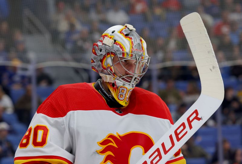 Oct 19, 2023; Buffalo, New York, USA;  Calgary Flames goaltender Dan Vladar (80) during a stoppage in play against the Buffalo Sabres during the second period at KeyBank Center. Mandatory Credit: Timothy T. Ludwig-USA TODAY Sports