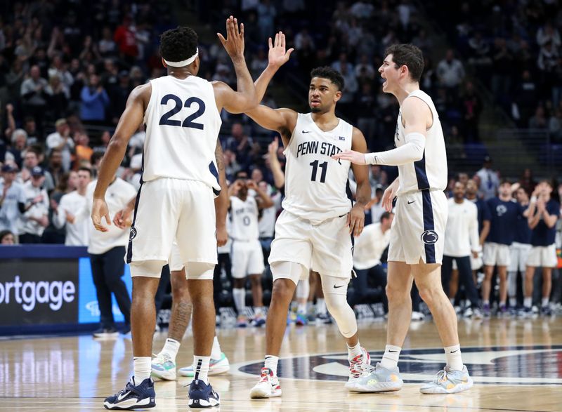 Mar 5, 2023; University Park, Pennsylvania, USA; Penn State Nittany Lions guard Camren Wynter (11) celebrates with teammates after a basket during the second half against the Maryland Terrapins at Bryce Jordan Center. Mandatory Credit: Matthew OHaren-USA TODAY Sports