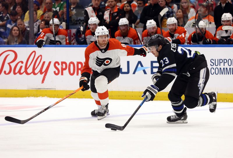 wMar 9, 2024; Tampa, Florida, USA;Tampa Bay Lightning center Michael Eyssimont (23) skates with the puck as Philadelphia Flyers defends during the second period at Amalie Arena. Mandatory Credit: Kim Klement Neitzel-USA TODAY Sports