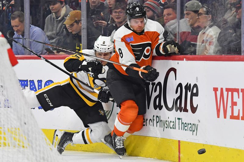 Jan 8, 2024; Philadelphia, Pennsylvania, USA; Philadelphia Flyers defenseman Cam York (8) is checked by Pittsburgh Penguins defenseman Chad Ruhwedel (2) during the third period at Wells Fargo Center. Mandatory Credit: Eric Hartline-USA TODAY Sports