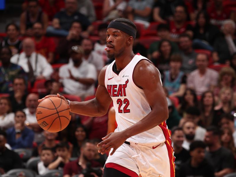 MIAMI, FL - MARCH 29: Jimmy Butler #22 of the Miami Heat dribbles the ball during the game against the Portland Trail Blazers on March 29, 2024 at Kaseya Center in Miami, Florida. NOTE TO USER: User expressly acknowledges and agrees that, by downloading and or using this Photograph, user is consenting to the terms and conditions of the Getty Images License Agreement. Mandatory Copyright Notice: Copyright 2024 NBAE (Photo by Issac Baldizon/NBAE via Getty Images)