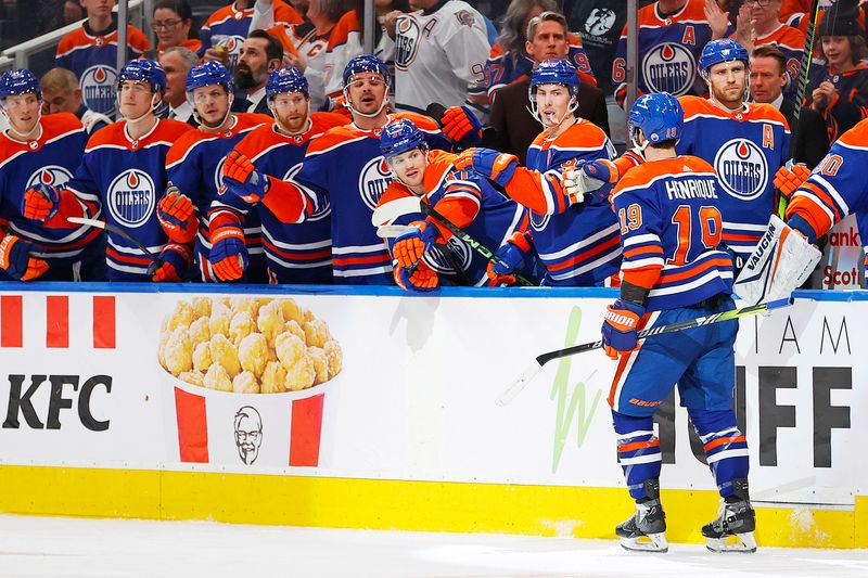 Apr 15, 2024; Edmonton, Alberta, CAN; The Edmonton Oilers celebrate a goal scored by forward Adam Henrique (19) during the first period against the San Jose Sharks at Rogers Place. Mandatory Credit: Perry Nelson-USA TODAY Sports