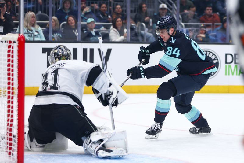 Dec 10, 2025; Seattle, Washington, USA;  Seattle Kraken right wing Kaapo Kakko (84) takes a shot at goal in the first period against the Los Angeles Kings at Climate Pledge Arena. Mandatory Credit: Kevin Ng-Imagn Images