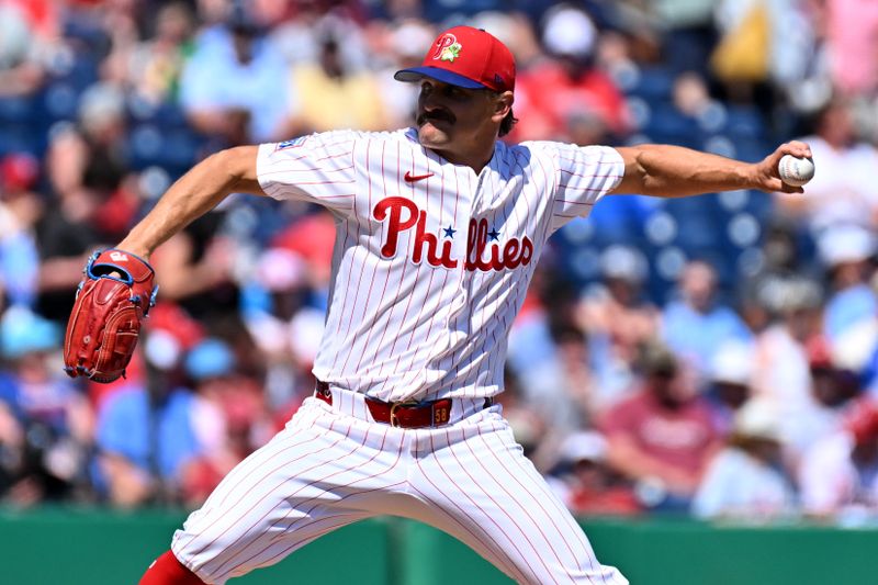 Mar 10, 2026; Clearwater, Florida, USA; Philadelphia Phillies starting pitcher Tanner Banks (58) throws in the first inning against the New York Yankees during spring training  at BayCare Ballpark. Mandatory Credit: Jonathan Dyer-Imagn Images