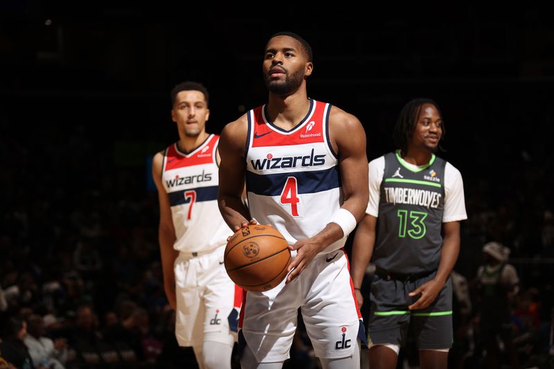 WASHINGTON, DC -? JANUARY 13:  Jared Butler #4 of the Washington Wizards shoots a free throw during the game against the Minnesota Timberwolves on January 13, 2025 at Capital One Arena in Washington, DC. NOTE TO USER: User expressly acknowledges and agrees that, by downloading and or using this Photograph, user is consenting to the terms and conditions of the Getty Images License Agreement. Mandatory Copyright Notice: Copyright 2025 NBAE (Photo by Stephen Gosling/NBAE via Getty Images)