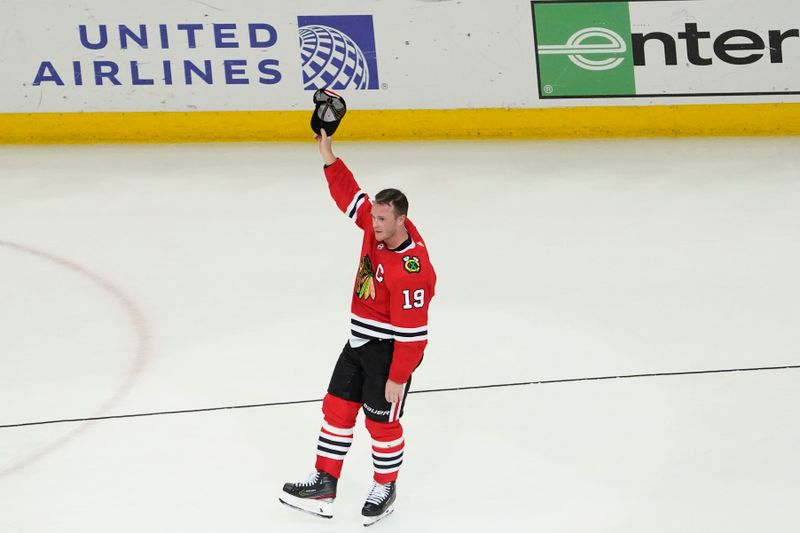 Apr 13, 2023; Chicago, Illinois, USA; Chicago Blackhawks center Jonathan Toews (19) is honored after the game against the Philadelphia Flyers. He played his last game as a Blackhawk, at United Center. Mandatory Credit: David Banks-USA TODAY Sports