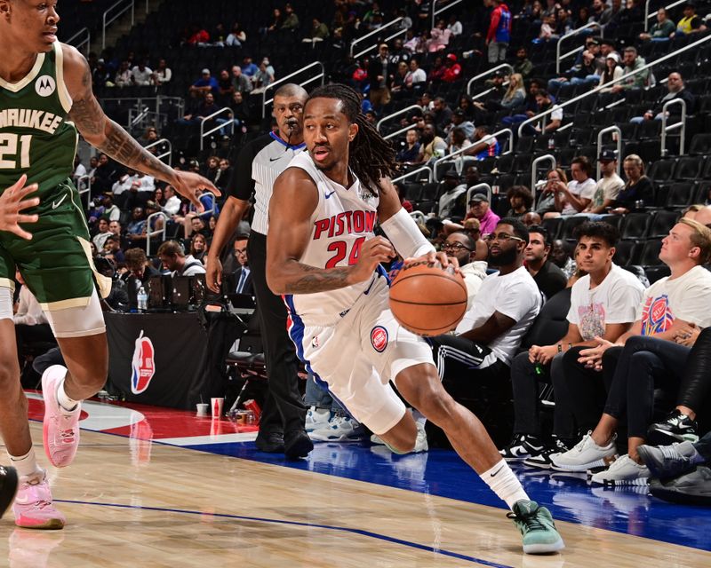 DETROIT, MI - OCTOBER 6: Daniss Jenkins #24 of the Detroit Pistons dribbles the ball during the game against the Milwaukee Bucks during a NBA preseason game on October 6, 2024 at Little Caesars Arena in Detroit, Michigan. NOTE TO USER: User expressly acknowledges and agrees that, by downloading and/or using this photograph, User is consenting to the terms and conditions of the Getty Images License Agreement. Mandatory Copyright Notice: Copyright 2024 NBAE (Photo by Chris Schwegler/NBAE via Getty Images)