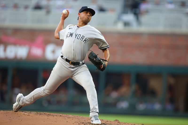 Aug 16, 2023; Atlanta, Georgia, USA; New York Yankees starting pitcher Randy Vasquez (98) throws against the Atlanta Braves in the first inning at Truist Park. Mandatory Credit: Brett Davis-USA TODAY Sports