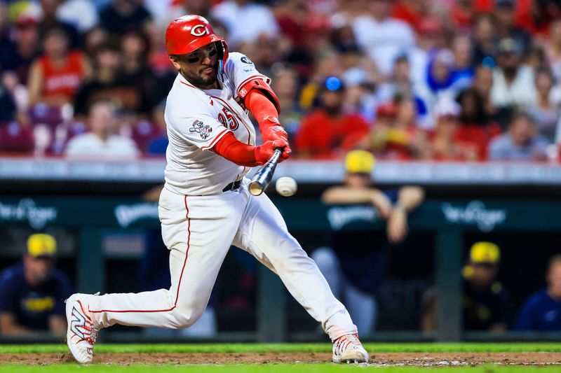 Aug 16, 2025; Cincinnati, Ohio, USA; Cincinnati Reds catcher Jose Trevino (35) bats against the Milwaukee Brewers in the seventh inning at Great American Ball Park. Mandatory Credit: Katie Stratman-Imagn Images