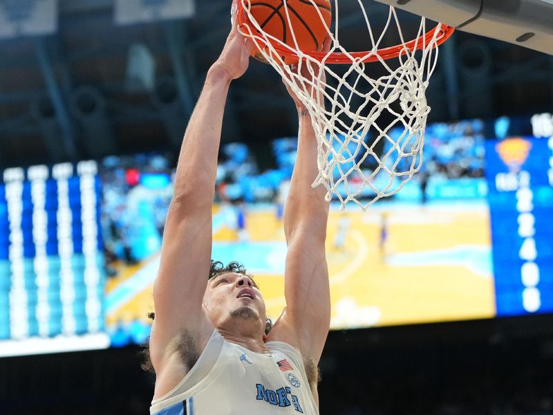 Feb 14, 2026; Chapel Hill, North Carolina, USA; North Carolina Tar Heels forward Zayden High (1) scores in the second half at Dean E. Smith Center. Mandatory Credit: Bob Donnan-Imagn Images