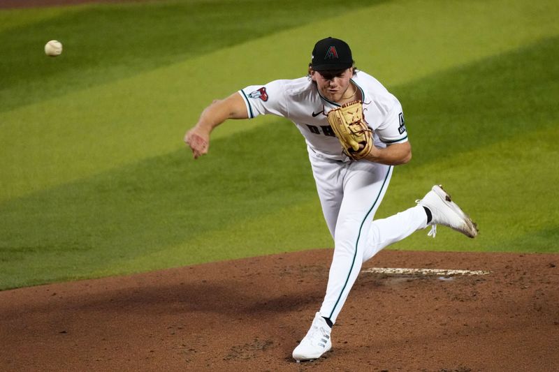 Oct 19, 2023; Phoenix, Arizona, USA; Arizona Diamondbacks starting pitcher Brandon Pfaadt (32) throws a pitch against the Philadelphia Phillies in the second inning during game three of the NLCS for the 2023 MLB playoffs at Chase Field. Mandatory Credit: Joe Camporeale-USA TODAY Sports