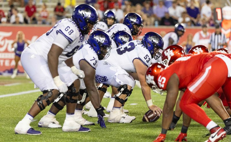 Sep 16, 2023; Houston, Texas, USA;TCU Horned Frogs offensive lineman John Lanz (53) under center against the Houston Cougars in the second half at TDECU Stadium. Mandatory Credit: Thomas Shea-USA TODAY Sports