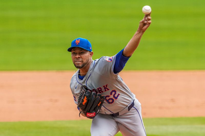 Apr 11, 2024; Cumberland, Georgia, USA; New York Mets starting pitcher Jose Quintana (62) pitches against the Atlanta Braves during the first inning at Truist Park. Mandatory Credit: Dale Zanine-USA TODAY Sports