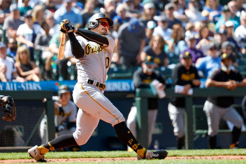 May 28, 2023; Seattle, Washington, USA; Pittsburgh Pirates designated hitter Bryan Reynolds (10) hits an RBI-triple against the Seattle Mariners during the eighth inning at T-Mobile Park. Mandatory Credit: Joe Nicholson-USA TODAY Sports