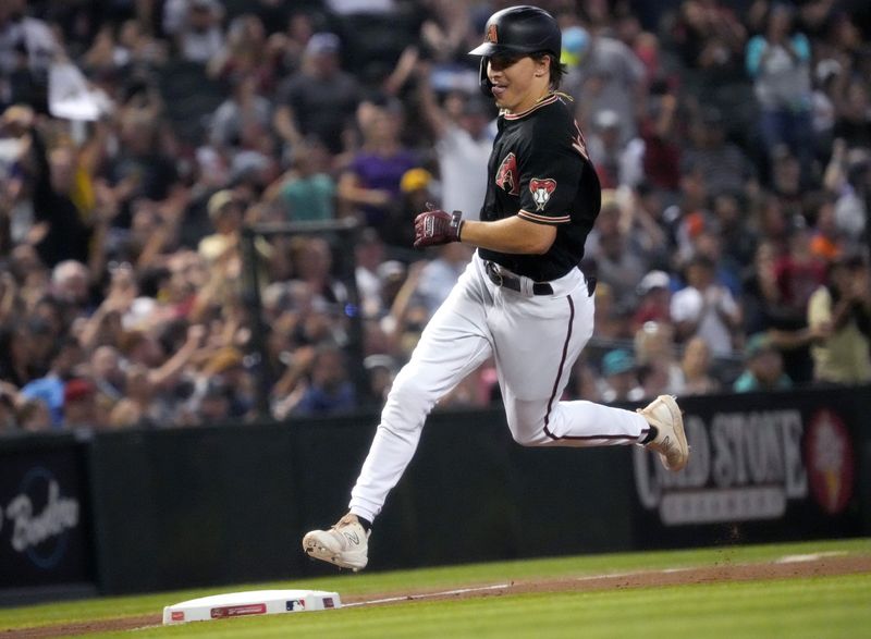 Jun 17, 2023; Phoenix, Arizona, USA; Arizona Diamondbacks Jake McCarthy (31) rounds third base after hitting a home run against the Cleveland Guardians at Chase Field. Mandatory Credit: Joe Rondone-USA TODAY Sports