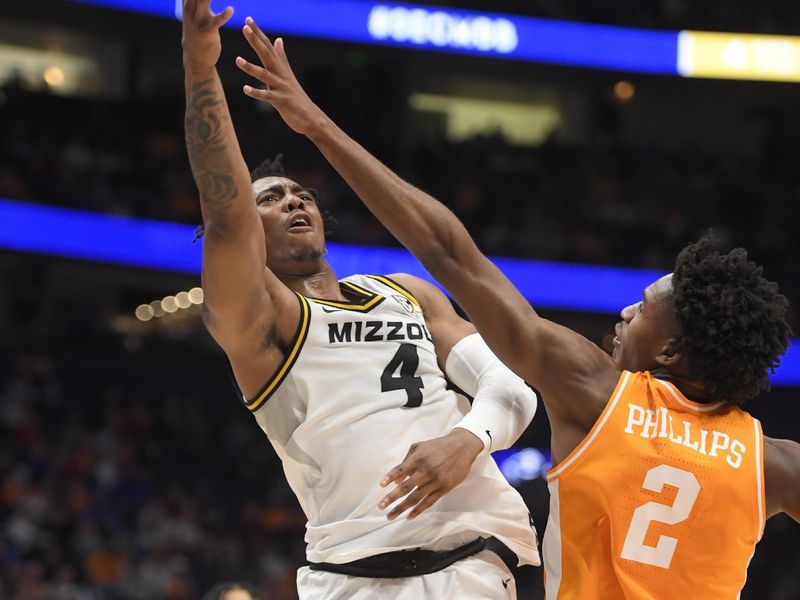 Mar 10, 2023; Nashville, TN, USA;  Missouri Tigers guard DeAndre Gholston (4) shoots over Tennessee Volunteers forward Julian Phillips (2) during the second half at Bridgestone Arena. Mandatory Credit: Steve Roberts-USA TODAY Sports