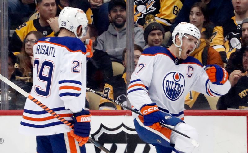 Feb 23, 2023; Pittsburgh, Pennsylvania, USA;  Edmonton Oilers center Connor McDavid (97) reacts after scoring a goal against the Pittsburgh Penguins during the first period at PPG Paints Arena. Mandatory Credit: Charles LeClaire-USA TODAY Sports