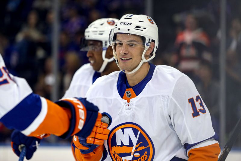 Sep 24, 2024; New York, New York, USA; New York Islanders center Mathew Barzal (13) celebrates his goal during the second period against the New York Rangers at Madison Square Garden. Mandatory Credit: Danny Wild-Imagn Images