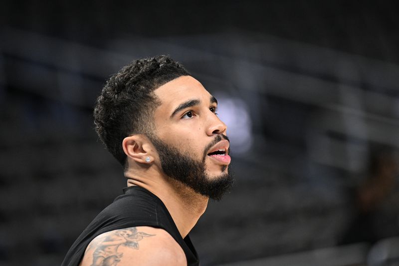 ATLANTA, GEORGIA - MARCH 25: Jayson Tatum #0 of the Boston Celtics warms up before the game against the Atlanta Hawks at State Farm Arena on March 25, 2024 in Atlanta, Georgia. NOTE TO USER: User expressly acknowledges and agrees that, by downloading and/or using this photograph, user is consenting to the terms and conditions of the Getty Images License Agreement. (Photo by Paras Griffin/Getty Images)