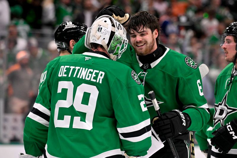 May 21, 2025; Dallas, Texas, USA; Dallas Stars goaltender Jake Oettinger (29) and defenseman Lian Bichsel (6) celebrate after the Stars defeat the Edmonton Oilers in game one of the Western Conference Final of the 2025 Stanley Cup Playoffs at American Airlines Center. Mandatory Credit: Jerome Miron-Imagn Images