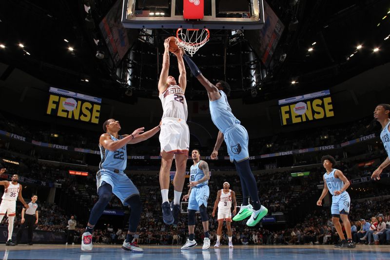 MEMPHIS, TN - FEBRUARY 25: Mason Plumlee #22 of the Phoenix Suns dunks the ball during the game against the Memphis Grizzlies on February 25, 2025 at FedExForum in Memphis, Tennessee. NOTE TO USER: User expressly acknowledges and agrees that, by downloading and or using this photograph, User is consenting to the terms and conditions of the Getty Images License Agreement. Mandatory Copyright Notice: Copyright 2025 NBAE (Photo by Joe Murphy/NBAE via Getty Images)