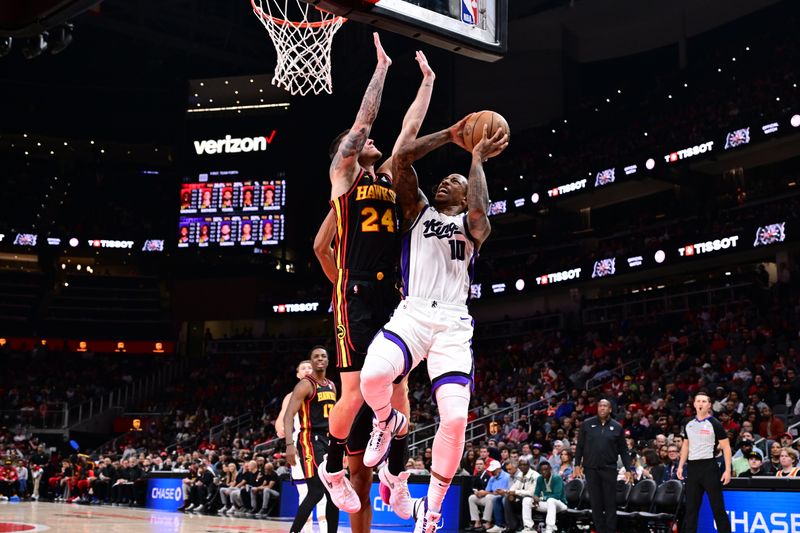 ATLANTA, GA - NOVEMBER 1: DeMar DeRozan #10 of the Sacramento Kings drives to the basket during the game against the Atlanta Hawks on November 1, 2024 at State Farm Arena in Atlanta, Georgia.  NOTE TO USER: User expressly acknowledges and agrees that, by downloading and/or using this Photograph, user is consenting to the terms and conditions of the Getty Images License Agreement. Mandatory Copyright Notice: Copyright 2024 NBAE (Photo by Adam Hagy/NBAE via Getty Images)