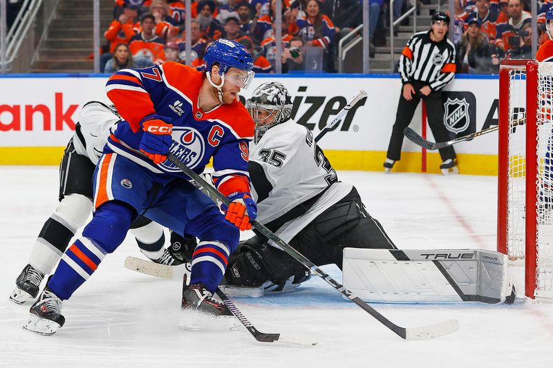 May 1, 2025; Edmonton, Alberta, CAN;Los Angeles Kings goaltender Darcy Kuemper (35) makes a save on Edmonton Oilers forward Connor McDavid (97) during the third period in game six of the first round of the 2025 Stanley Cup Playoffs at Rogers Place. Mandatory Credit: Perry Nelson-Imagn Images