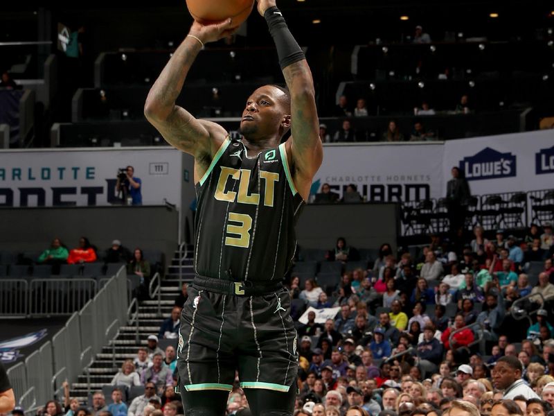 CHARLOTTE, NC - FEBRUARY 5: Terry Rozier #3 of the Charlotte Hornets shoots a three point basket against the Orlando Magic on February 5, 2023 at Spectrum Center in Charlotte, North Carolina. NOTE TO USER: User expressly acknowledges and agrees that, by downloading and or using this photograph, User is consenting to the terms and conditions of the Getty Images License Agreement. Mandatory Copyright Notice: Copyright 2023 NBAE (Photo by Kent Smith/NBAE via Getty Images)