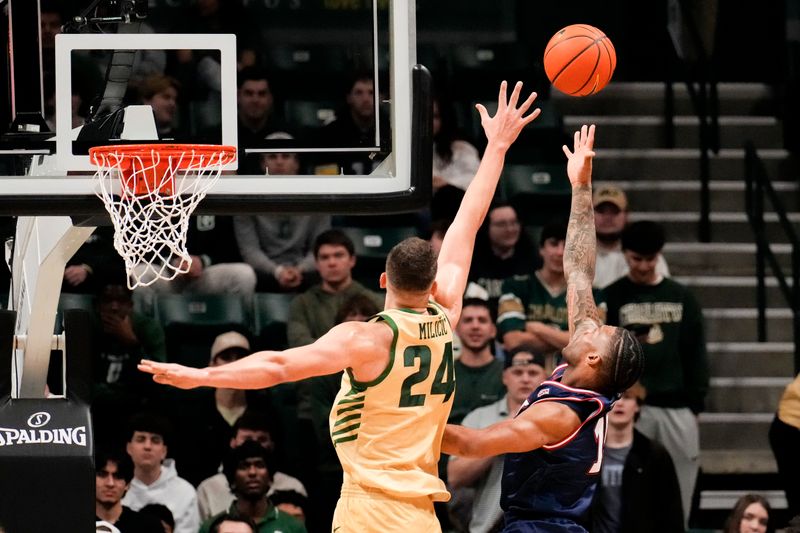 Jan 6, 2024; Charlotte, North Carolina, USA; Florida Atlantic Owls guard Alijah Martin (15) shoots over Charlotte 49ers forward Igor Milicic Jr. (24) during the first half at Dale F. Halton Arena. Mandatory Credit: Jim Dedmon-USA TODAY Sports