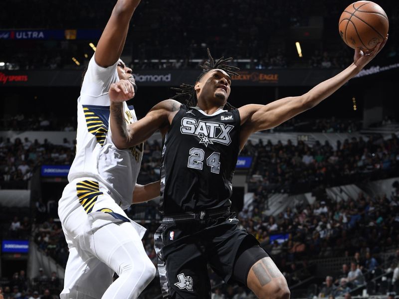 HOUSTON, TX - MARCH 3: Devin Vassell #24 of the San Antonio Spurs drives to the basket during the game against the Indiana Pacers on March 3, 2024 at the Toyota Center in Houston, Texas. NOTE TO USER: User expressly acknowledges and agrees that, by downloading and or using this photograph, User is consenting to the terms and conditions of the Getty Images License Agreement. Mandatory Copyright Notice: Copyright 2024 NBAE (Photo by Logan Riely/NBAE via Getty Images)