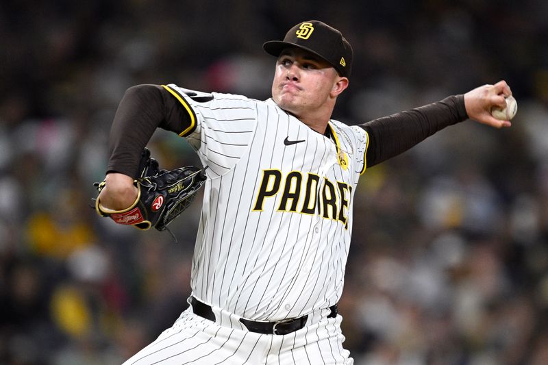 Jun 10, 2024; San Diego, California, USA; San Diego Padres relief pitcher Adrian Morejon (50) pitches against the Oakland Athletics during the seventh inning at Petco Park. Mandatory Credit: Orlando Ramirez-USA TODAY Sports