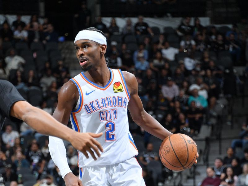 SAN ANTONIO, TX - NOVEMBER 19: Shai Gilgeous-Alexander #2 of the Oklahoma City Thunder dribbles the ball during the game against the San Antonio Spurs during the Emirates NBA Cup game on November 19, 2024 at the Frost Bank Center in San Antonio, Texas. NOTE TO USER: User expressly acknowledges and agrees that, by downloading and or using this photograph, user is consenting to the terms and conditions of the Getty Images License Agreement. Mandatory Copyright Notice: Copyright 2024 NBAE (Photos by Michael Gonzales/NBAE via Getty Images)