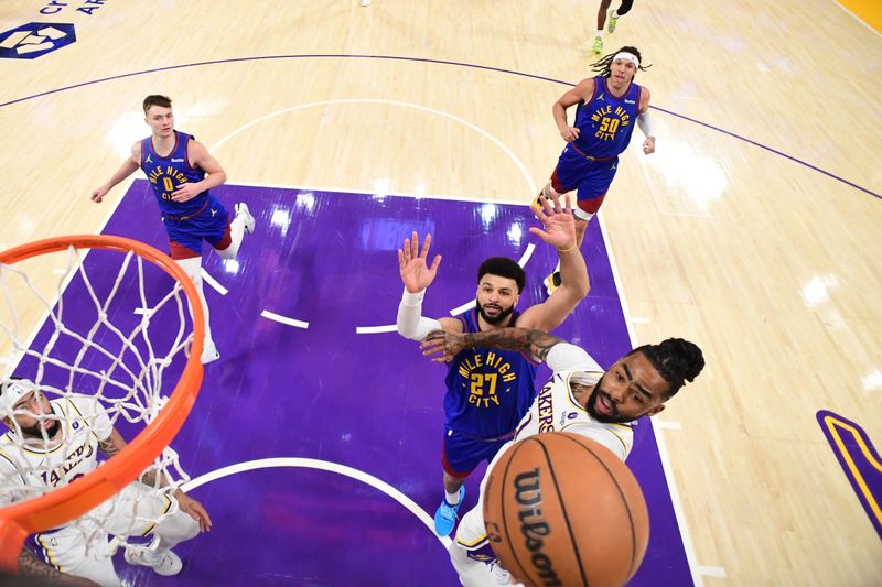 LOS ANGELES, CA - MARCH 2: D'Angelo Russell #1 of the Los Angeles Lakers drives to the basket during the game against the Denver Nuggets on March 2, 2024 at Crypto.Com Arena in Los Angeles, California. NOTE TO USER: User expressly acknowledges and agrees that, by downloading and/or using this Photograph, user is consenting to the terms and conditions of the Getty Images License Agreement. Mandatory Copyright Notice: Copyright 2024 NBAE (Photo by Adam Pantozzi/NBAE via Getty Images)