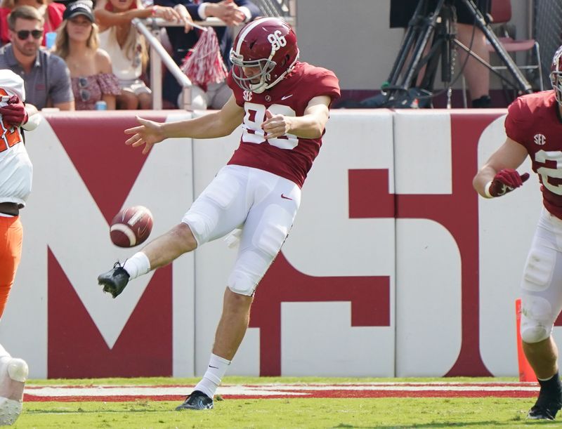 Sep 11, 2021; Tuscaloosa, Alabama, USA; Alabama Crimson Tide punter James Burnip (86) punts to Mercer Bears at Bryant-Denny Stadium. Mandatory Credit: Marvin Gentry-USA TODAY Sports