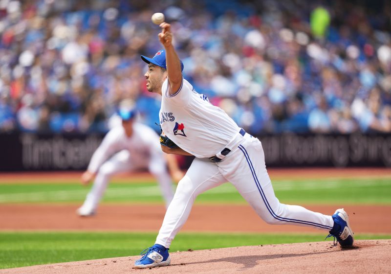 Jul 16, 2023; Toronto, Ontario, CAN; Toronto Blue Jays starting pitcher Yusei Kikuchi (16) throws pitch against the Arizona Diamondbacks during the first inning at Rogers Centre. Mandatory Credit: Nick Turchiaro-USA TODAY Sports