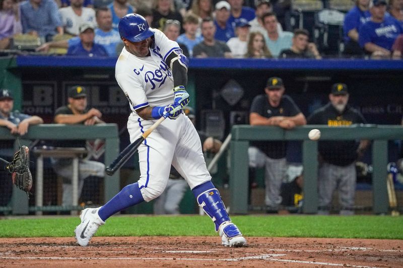 Aug 29, 2023; Kansas City, Missouri, USA; Kansas City Royals first baseman Salvador Perez (13) singles against the Pittsburgh Pirates in the fourth inning at Kauffman Stadium. Mandatory Credit: Denny Medley-USA TODAY Sports